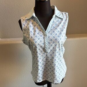 TOMMY BAHAMA golf top
White with blue pattern size L